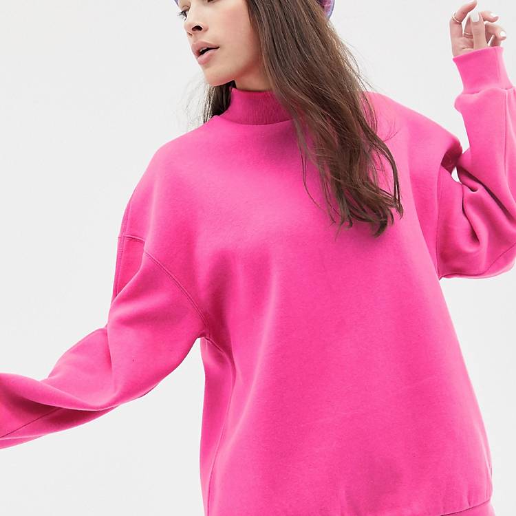 Lima Verandert in Ik geloof Bershka high neck oversized sweater in neon pink | ASOS