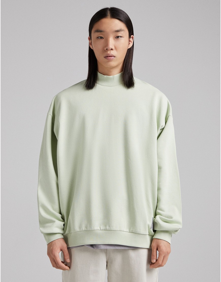 Bershka high neck sweatshirt in pastel green