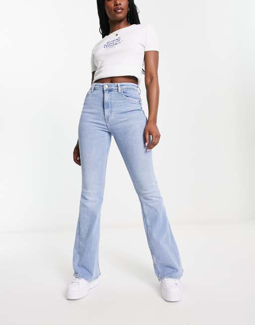 Bershka Petite clean flare jeans in light blue