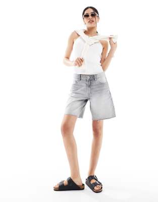 high rise raw hem longline denim shorts in washed gray