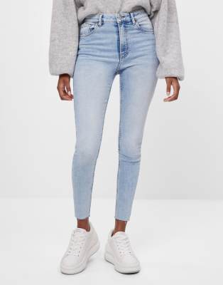 Bershka high rise skinny jean in bleach blue | ASOS