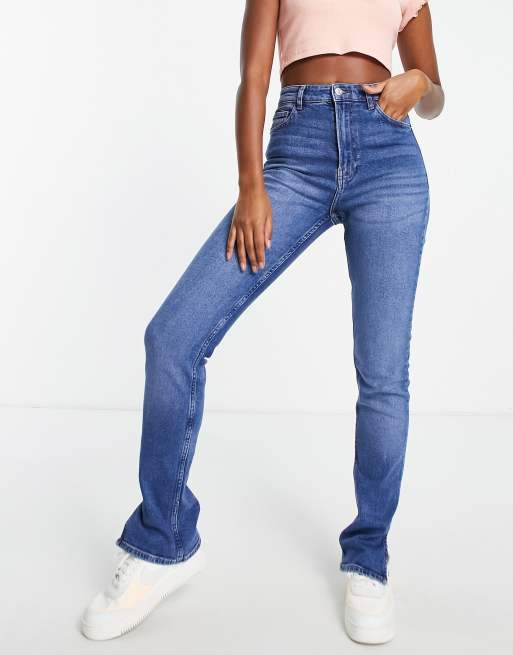 Bershka high waist skinny jean with split hem detail in medium blue | ASOS