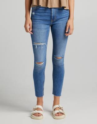 Bershka high waist skinny jeans with rip detail in medium stone-Blues