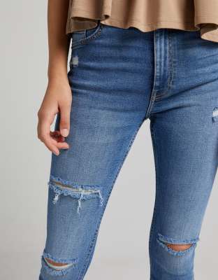 bershka super high waist skinny jean in mid blue