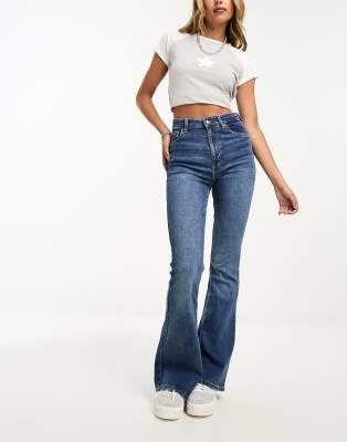 high waisted flared jeans in dark blue wash