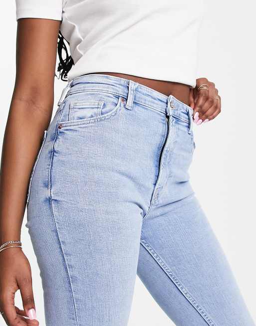 Bershka high waisted flared jeans in mid blue