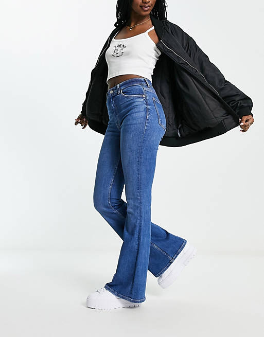 Bershka high waisted flared jeans in mid blue | ASOS