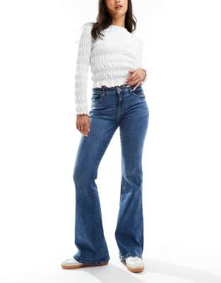 high waisted flared jeans in mid wash blue