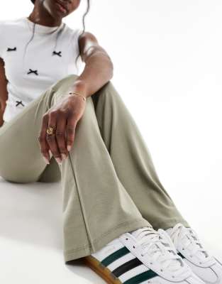Bershka high waisted flared trousers in light khaki | ASOS
