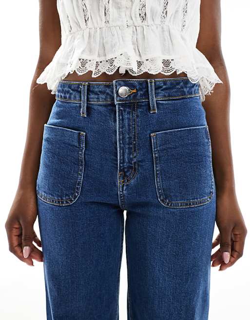 Bershka high waisted pocket detail jeans in mid wash | ASOS Bershka high waisted pocket detail jeans in mid wash | ASOS