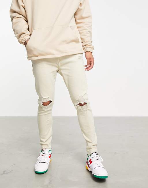 Bershka - Jean ultra skinny à déchirures - Écru