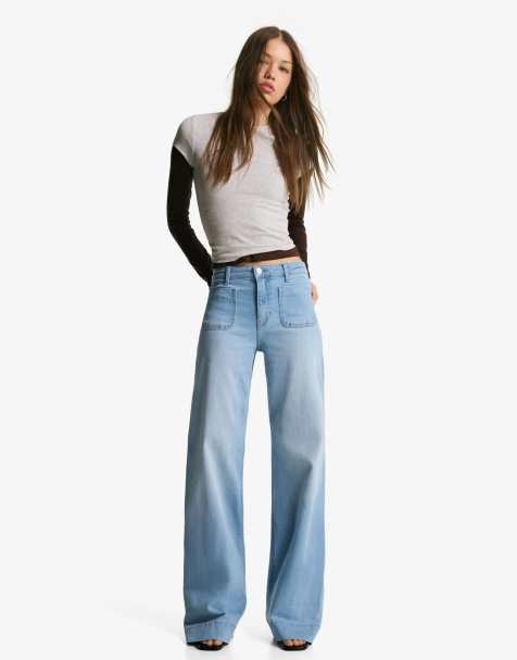 Bershka - Jeans a fondo ampio senza cuciture color azzurro chiaro con tasche - view 1
