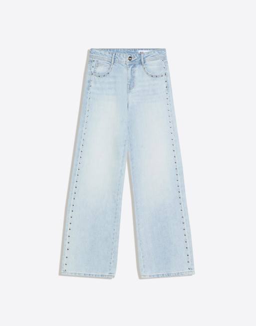 Bershka - Jeans ampi a vita bassa color blu medio con borchie
