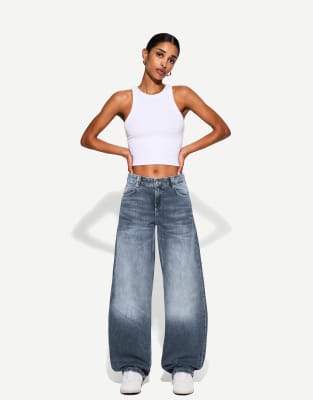 Bershka - Jeans aus Denim in Blau mit weitem Bein