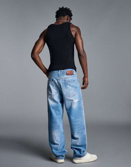 Bershka jeans dritti a gamba larga strappati blu medio, 4 di 5