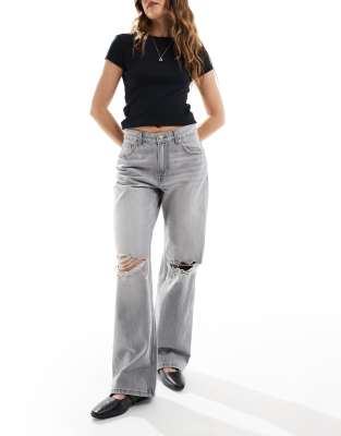 Bershka - Jeans in Hellgrau mit weitem Bein und Knierissen