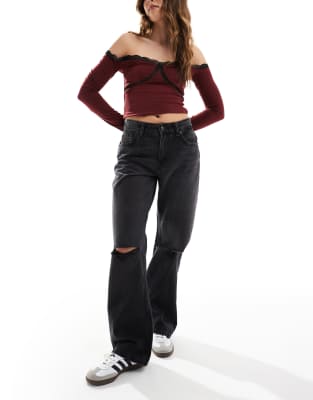 Bershka - Jeans in Schwarz mit weitem Schnitt und Knierissen