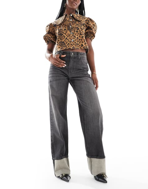 Bershka – Jeans in schwarzer Dirty-Waschung mit weitem Bein und Umschlag - view 1