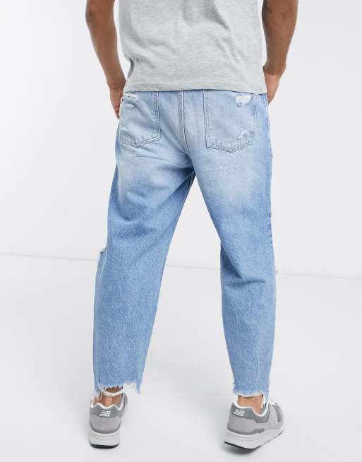 Jeans uomo deals larghi sotto