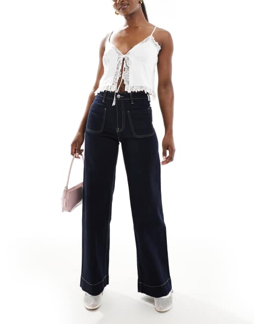 Bershka - Jeans met hoge taille en zakdetail in indigo