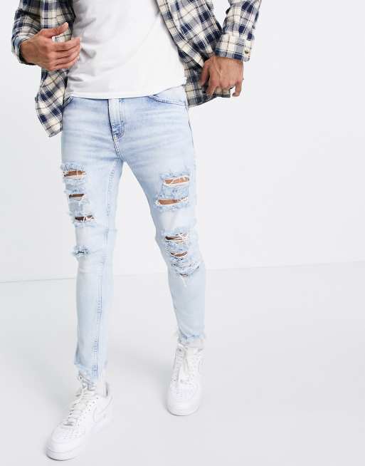 Bershka - Jeans skinny con strappi colore azzurro