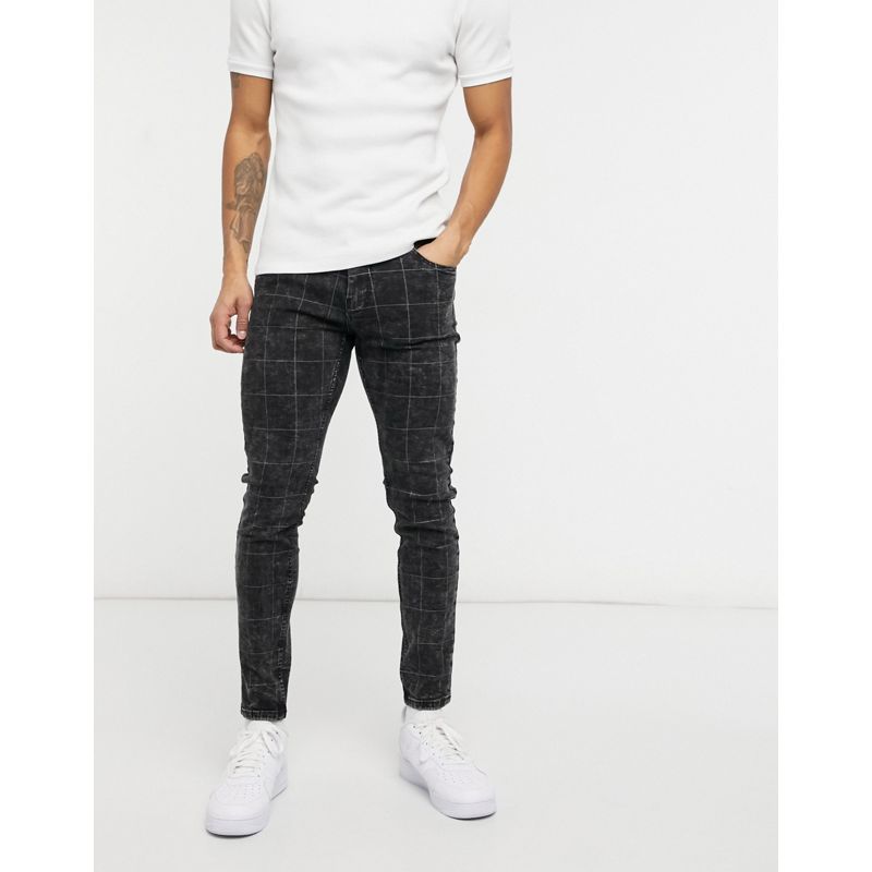 Pantaloni e chino Uomo Bershka - Jeans skinny nero slavato con stampa a griglia