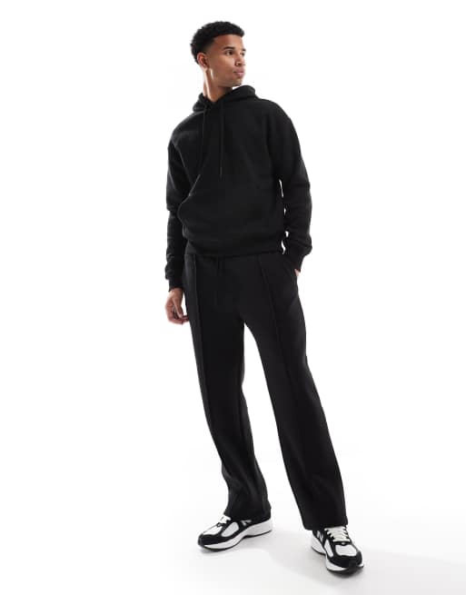 Bershka - Jersey hoodie en joggingbroek met wijde pijpen in zwart