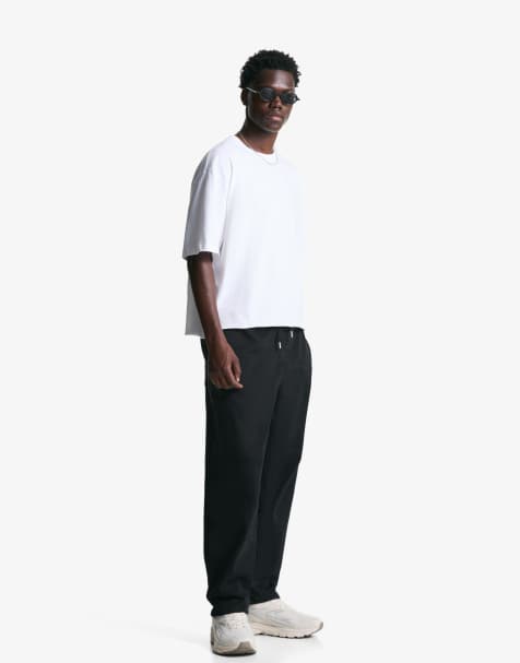 Bershka Jogger jeans in black - view 1