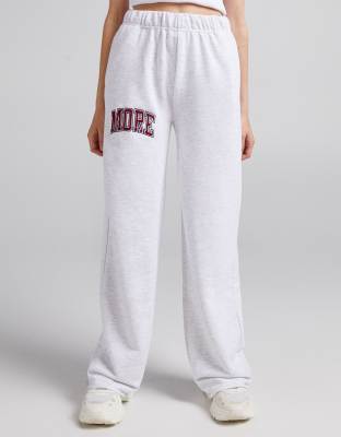 Bershka - Jogger oversize à slogan - Gris chiné
