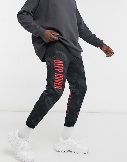Bershka jogger with red print in black