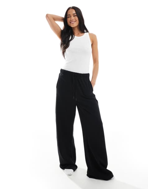 Bershka - Joggingbroek met wijde pijpen in zwart - view 1