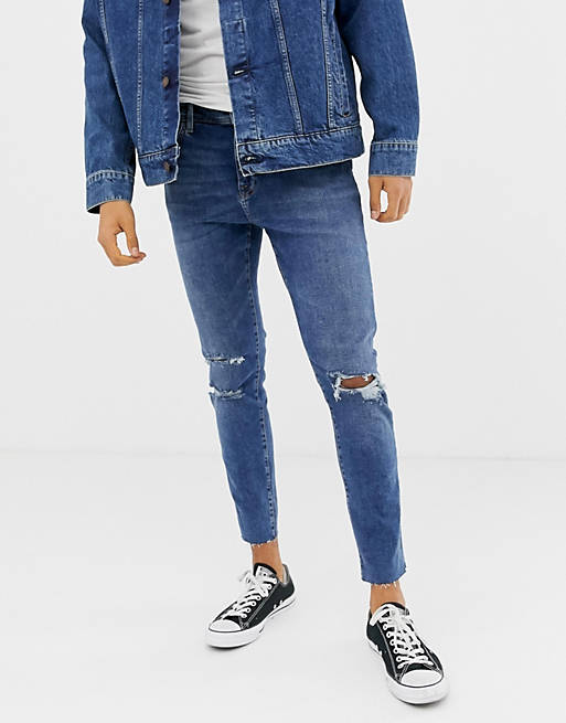 Bershka Join Life Cotton slim fit jeans in mid blue | ASOS