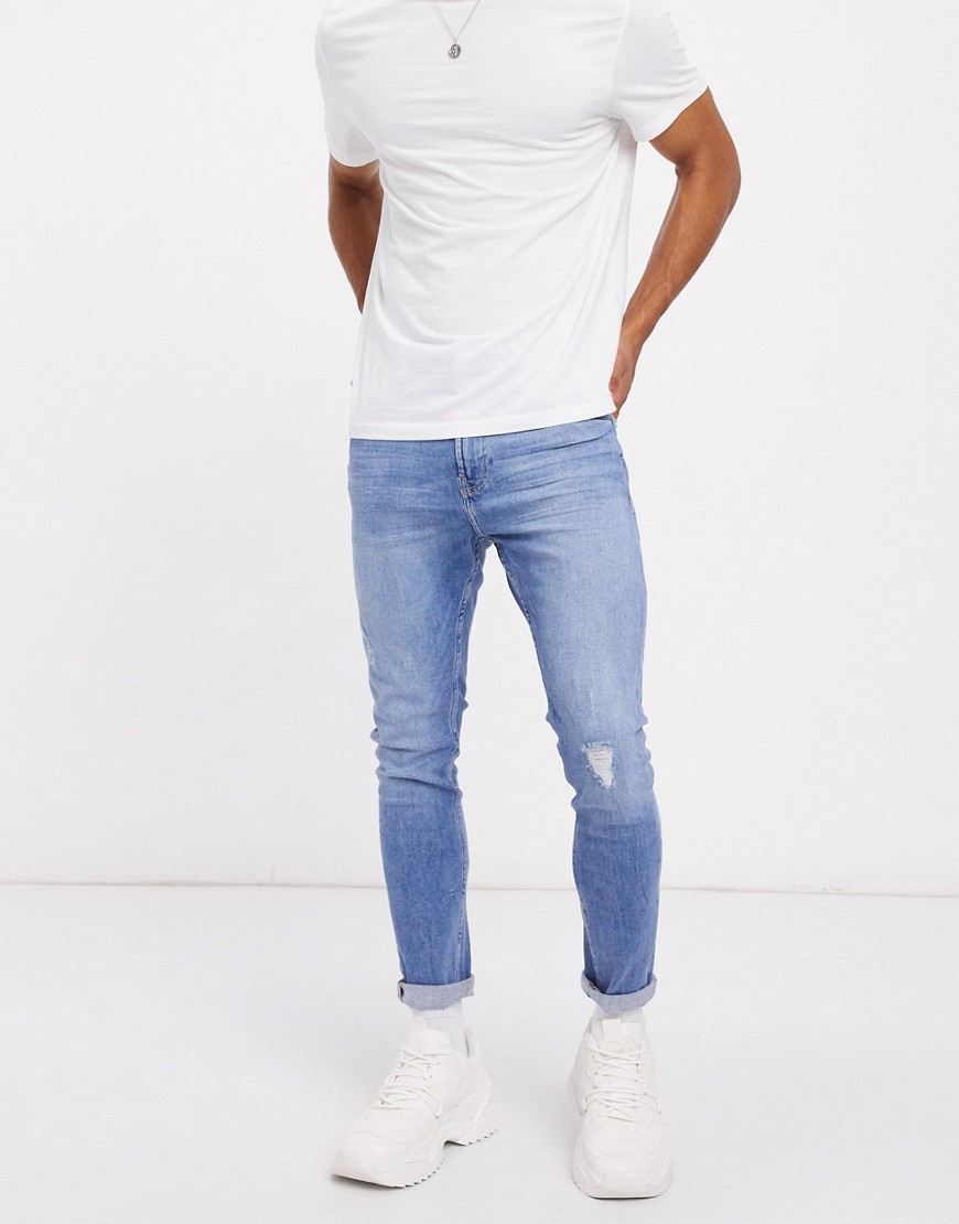 Bershka Join Life super skinny jeans with abrasions in mid blue