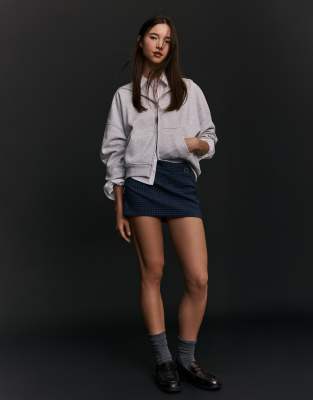 Bershka - Jupe-short courte avec boucle - Bleu-Bleu marine