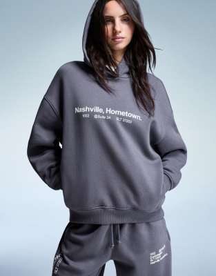 Bershka - Kapuzenpullover in Grau mit Print-Neutral