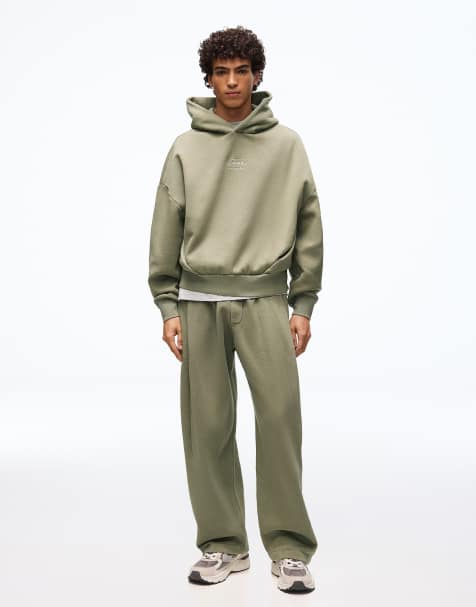 Bershka – Kapuzenpullover in verwaschenem Khaki mit kastigem Schnitt - view 1