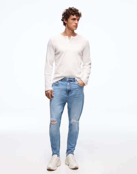 Bershka – Karottenjeans in Hellblau mit Zierrissen - view 1