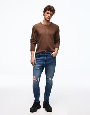 Karottenjeans in Jeansblau mit Zierrissen Blau 42