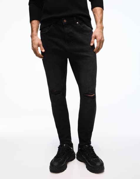 Bershka – Karottenjeans in Schwarz mit Zierrissen - view 1