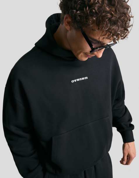 Bershka – Kastiger Kapuzenpullover in Schwarz mit Print - view 1