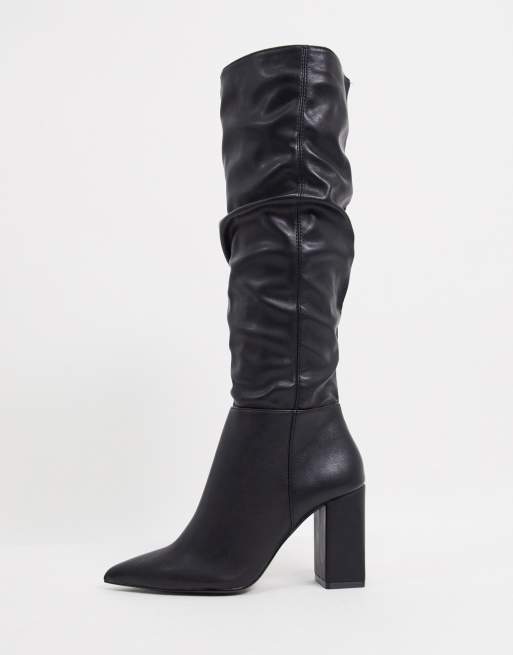 Bershka knee high faux leather slouchy boots in black | ASOS