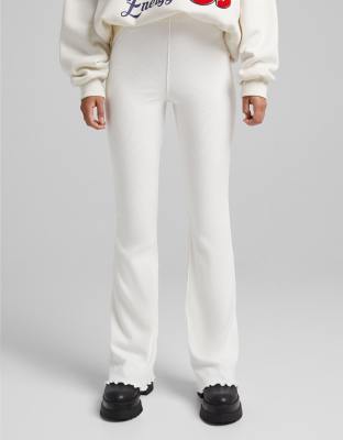 Bershka knitted flare pants co-ord with lettuce hem detail in ecru - ASOS Price Checker