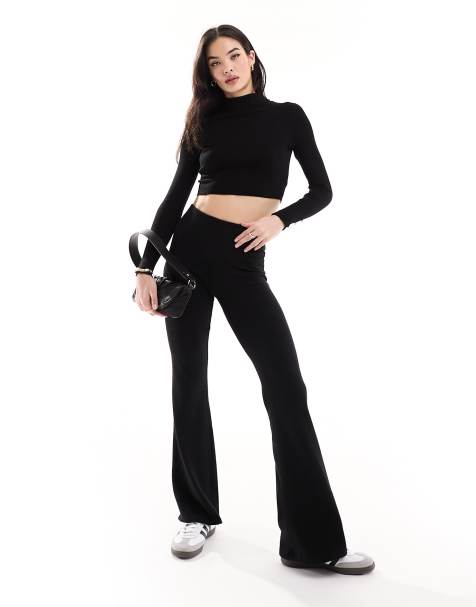 Bershka folded waistband flared pants in black