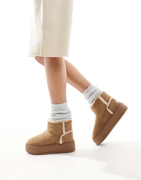 Bershka - Knusse laarzen met rand van imitatieschapenvacht in beige - view 1