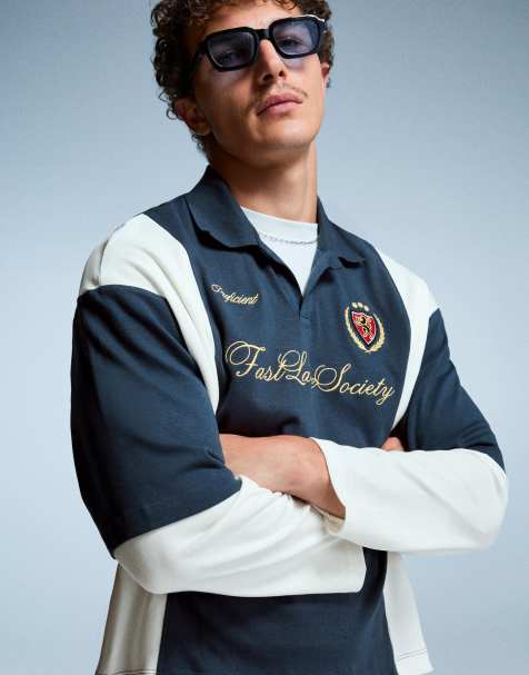 Bershka – Kurzärmliges, kastiges Polohemd in Jeansblau mit Print - view 1