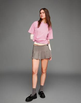 Bershka - Kurzärmliges Oversize-T-Shirt in Rosa mit Print