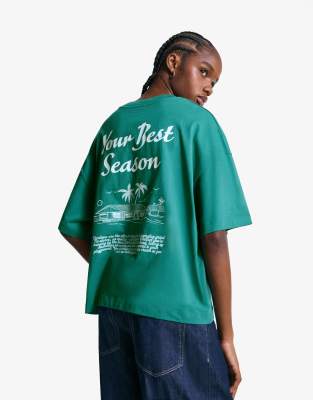 Bershka - Kurzärmliges T-Shirt in Grün mit Print