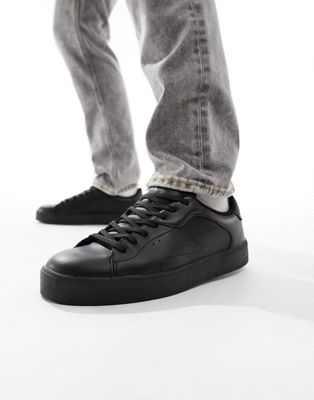 Bershka lace up trainer in black