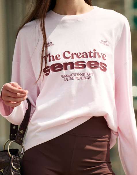 Bershka – Langärmliges, kastiges T-Shirt in Rosa mit Print - view 1