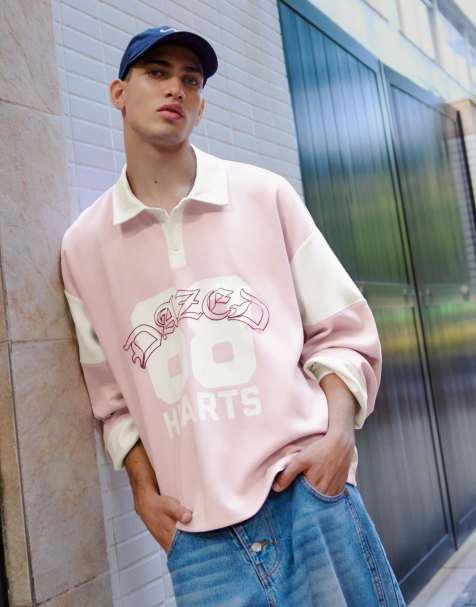 Bershka – Langärmliges Polohemd in Hellrosa mit Print - view 1